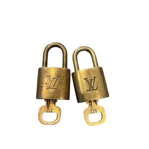 Set of two Louis Vuitton Brass Padlocks with Keys